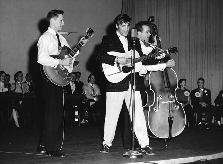 Elvis performs with Scotty Moore and Bill Black at Messick High School in Memphis, TN on February 6th, 1955